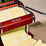 Marcato Atlas 150 pasta maker with fresh pasta sheets ready for use