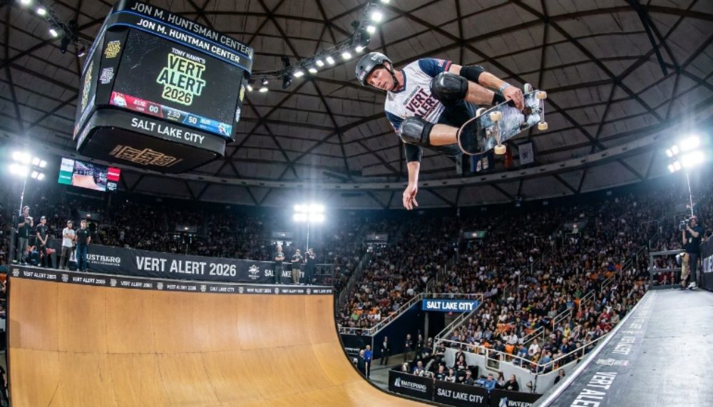 Tony Hawk's Vert Alert 2026 skater launching high above the vert ramp at Jon M. Huntsman Center in Salt Lake City