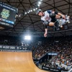 Tony Hawk's Vert Alert 2026 skater launching high above the vert ramp at Jon M. Huntsman Center in Salt Lake City