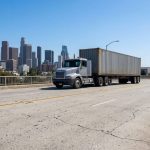 Commercial truck being weighed at a highway inspection station