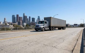 Commercial truck being weighed at a highway inspection station
