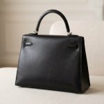 Designer handbag authenticity inspection in Chicago boutique