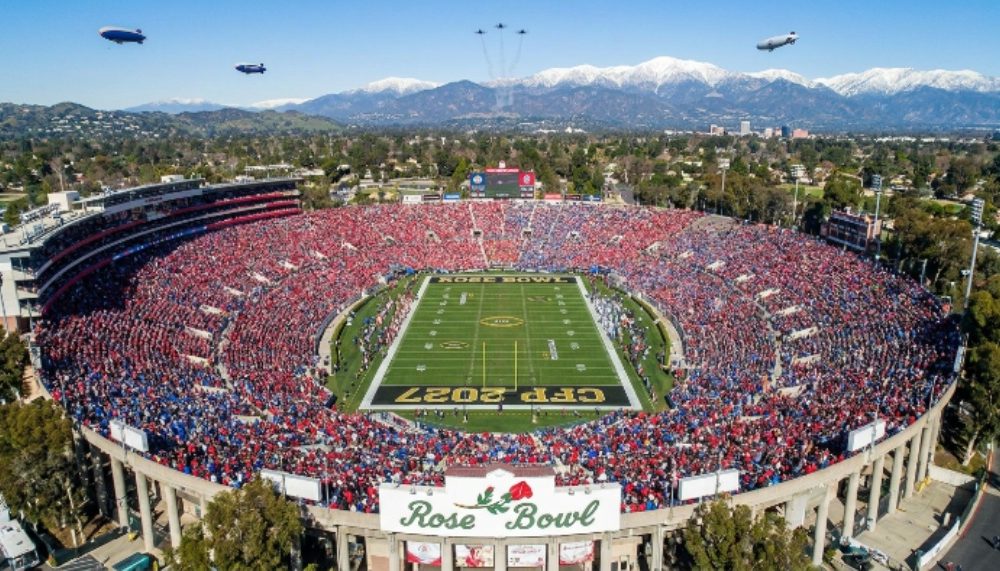Aerial view of the packed Rose Bowl Stadium in Pasadena, California on New Year's Day 2027 during the CFP Quarterfinal game with the San Gabriel Mountains visible in the background